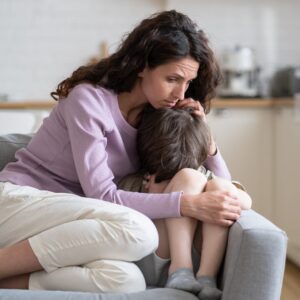 Parent with child who is gireving